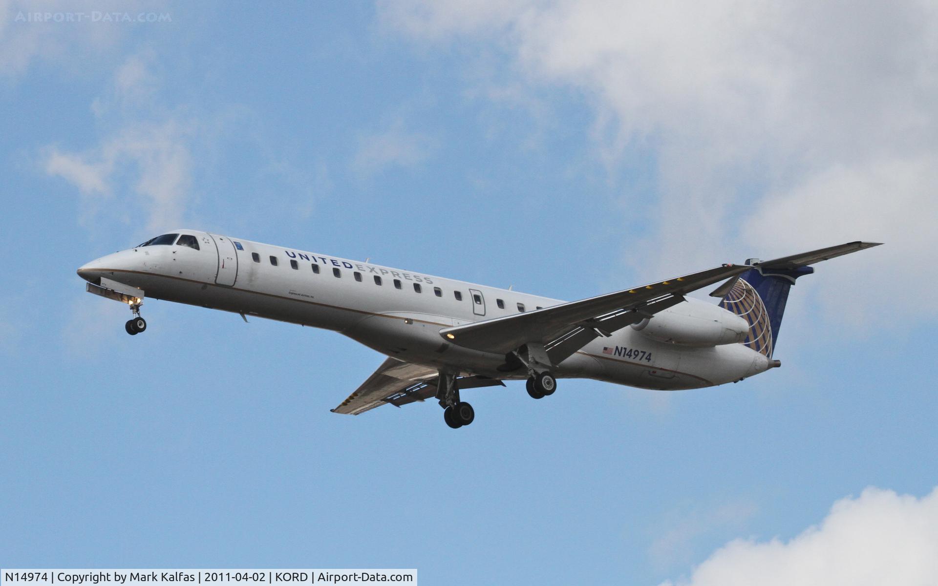 N14974, 1999 Embraer ERJ-145LR (EMB-145LR) C/N 145161, ExpressJet/United Express Embraer EMB-145LR, BTA6047 arriving from KDSM, on approach RWY 28 KORD.