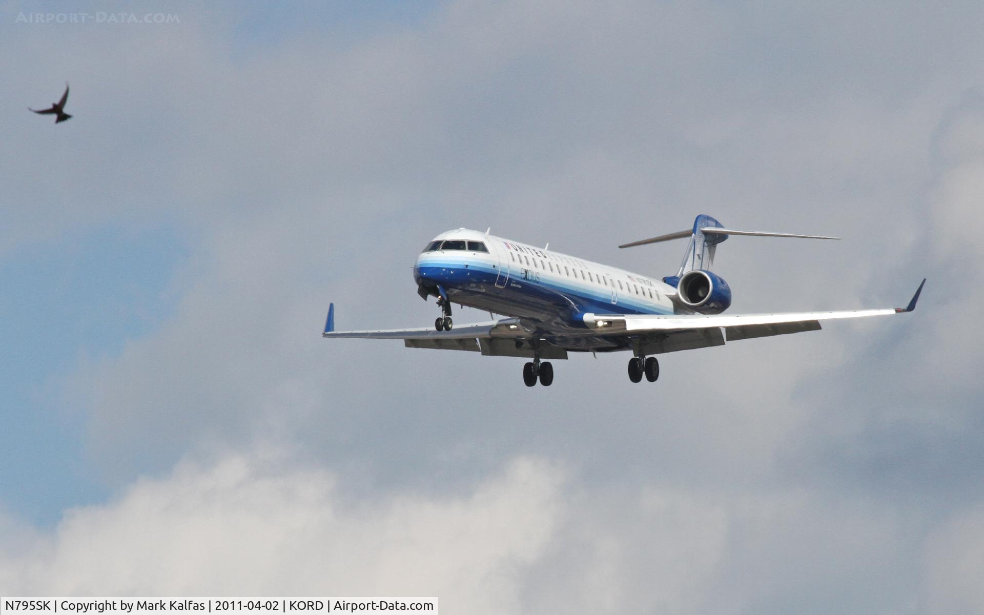 N795SK, 2010 Bombardier CRJ-700 (CL-600-2C10) Regional Jet C/N 10299, SkyWest/United Express Bombardier CL-600-2C10, SKW7012 Arriving from KASE, on approach RWY 28 KORD.