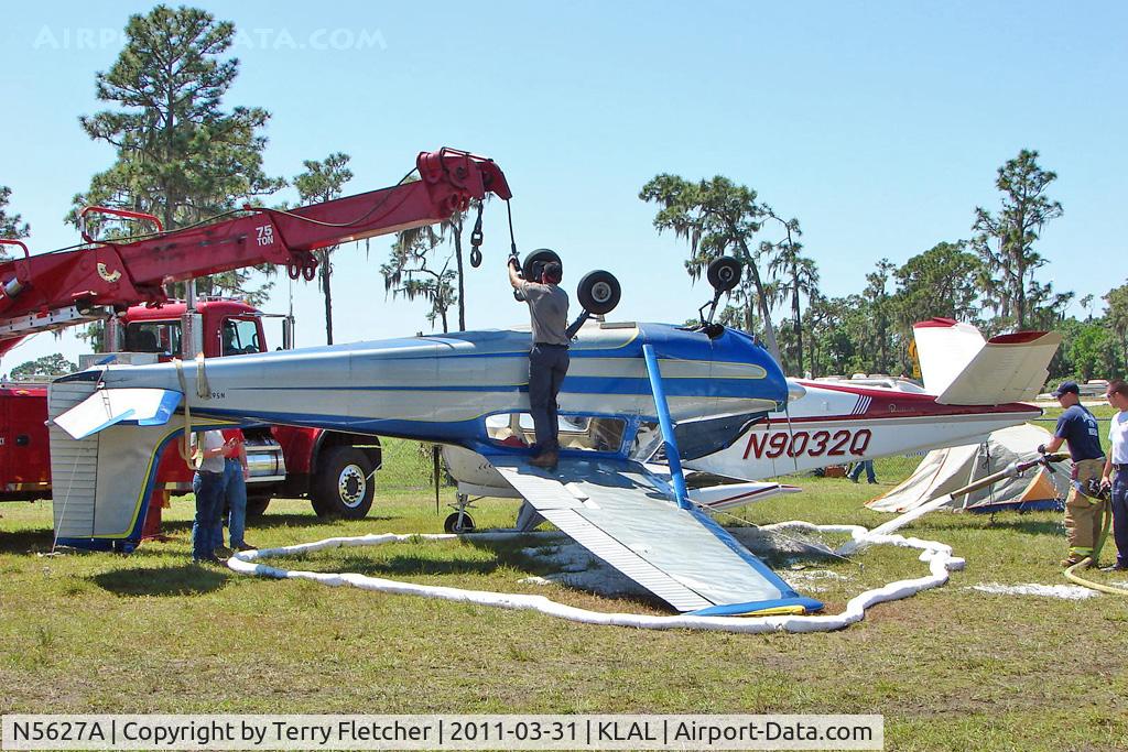 N5627A, 1956 Cessna 172 C/N 28227, 1956 Cessna 172, c/n: 28227 storm damaged in the Camping area at 2011 Sun n Fun