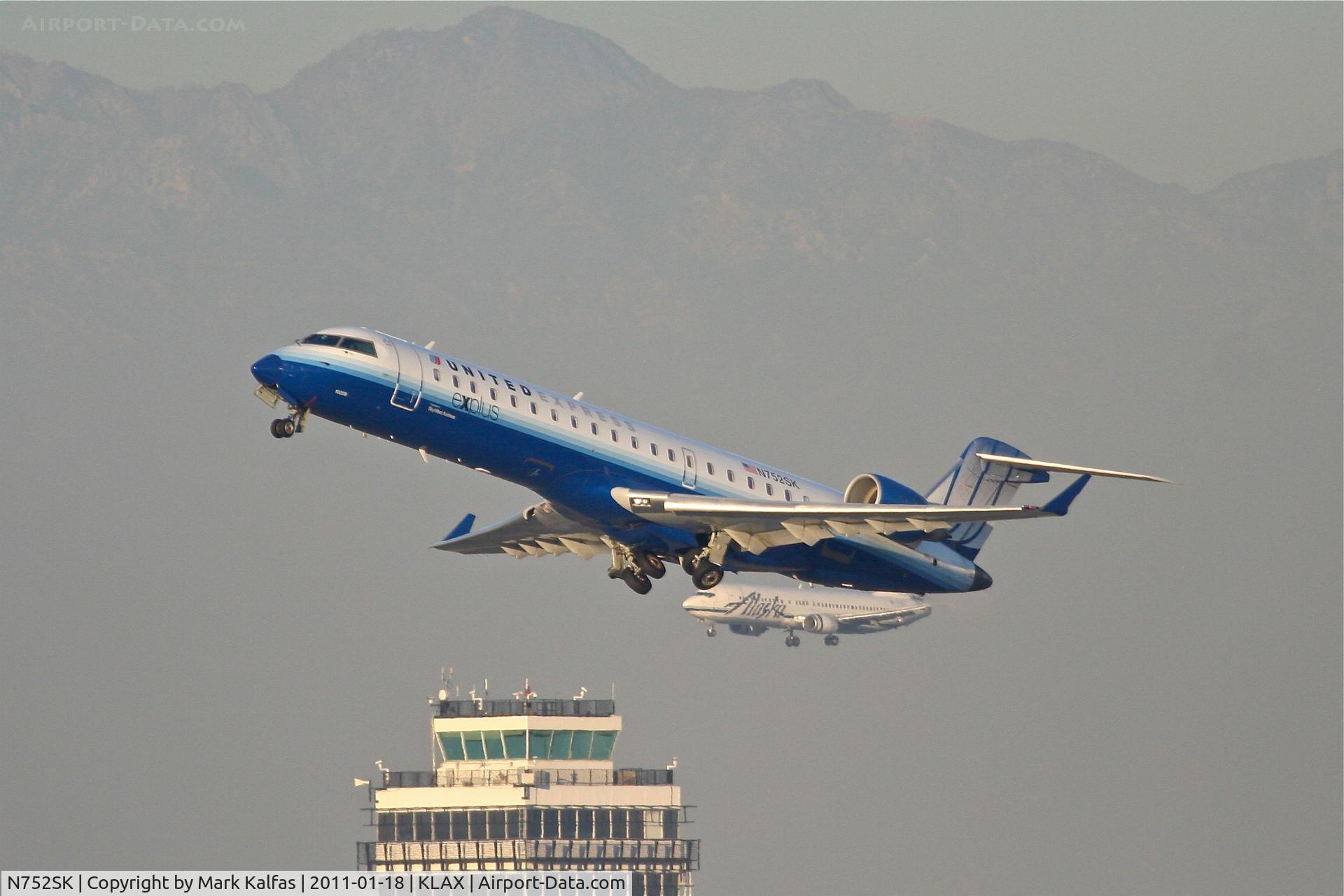 N752SK, 2005 Bombardier CRJ-701ER (CL-600-2C10) Regional Jet C/N 10209, SkyWest/United Express Bombardier CL-600-2C10, SKW4796 departing RWY 25R enroute to KPHX.