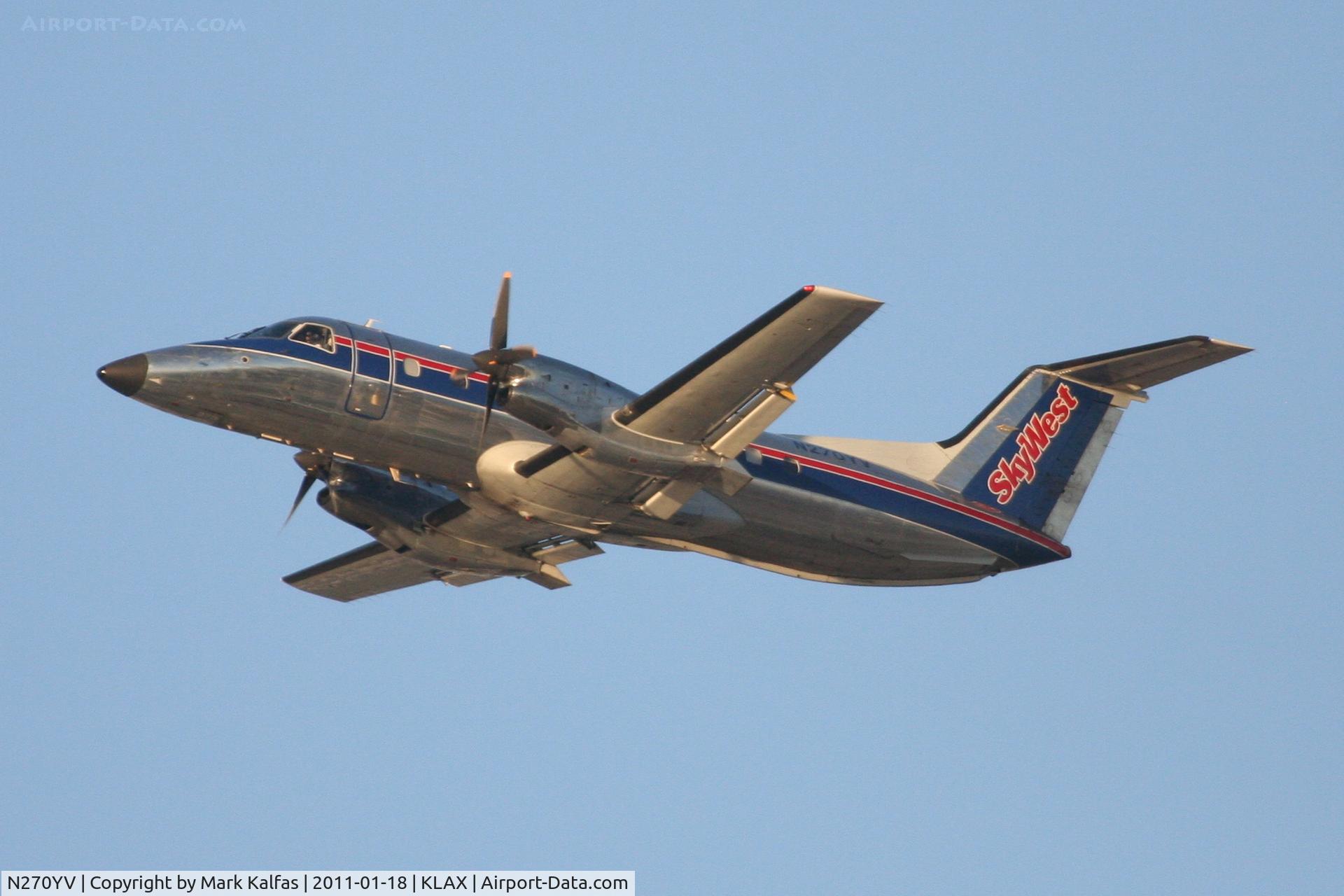 N270YV, 1993 Embraer EMB-120ER Brasilia C/N 120.270, SkyWest/United Express Embraer EMB-120ER, SKW6305 departing RWY 25R enroute to KPSP.