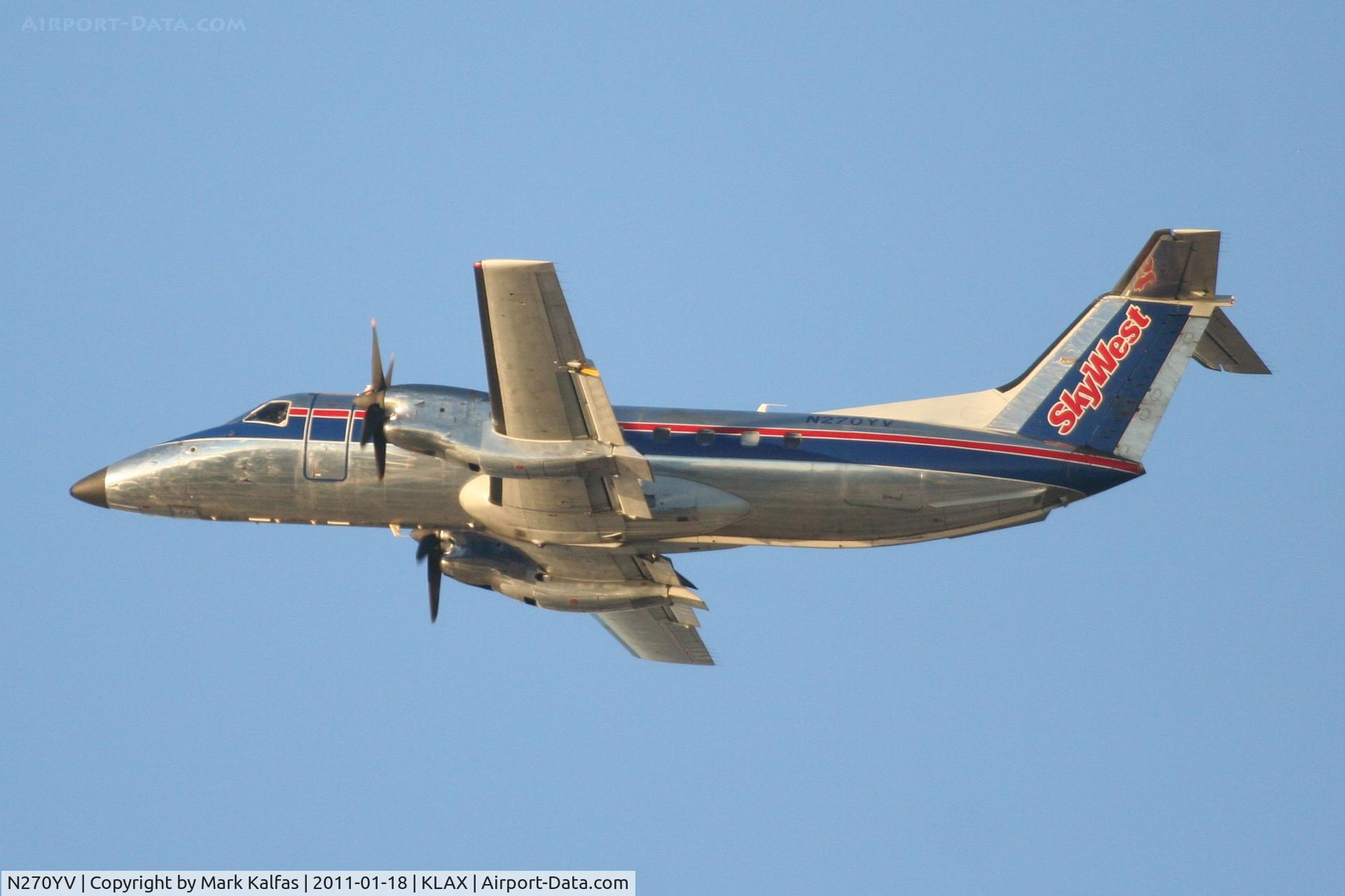N270YV, 1993 Embraer EMB-120ER Brasilia C/N 120.270, SkyWest/United Express Embraer EMB-120ER, SKW6305 departing RWY 25R enroute to KPSP.