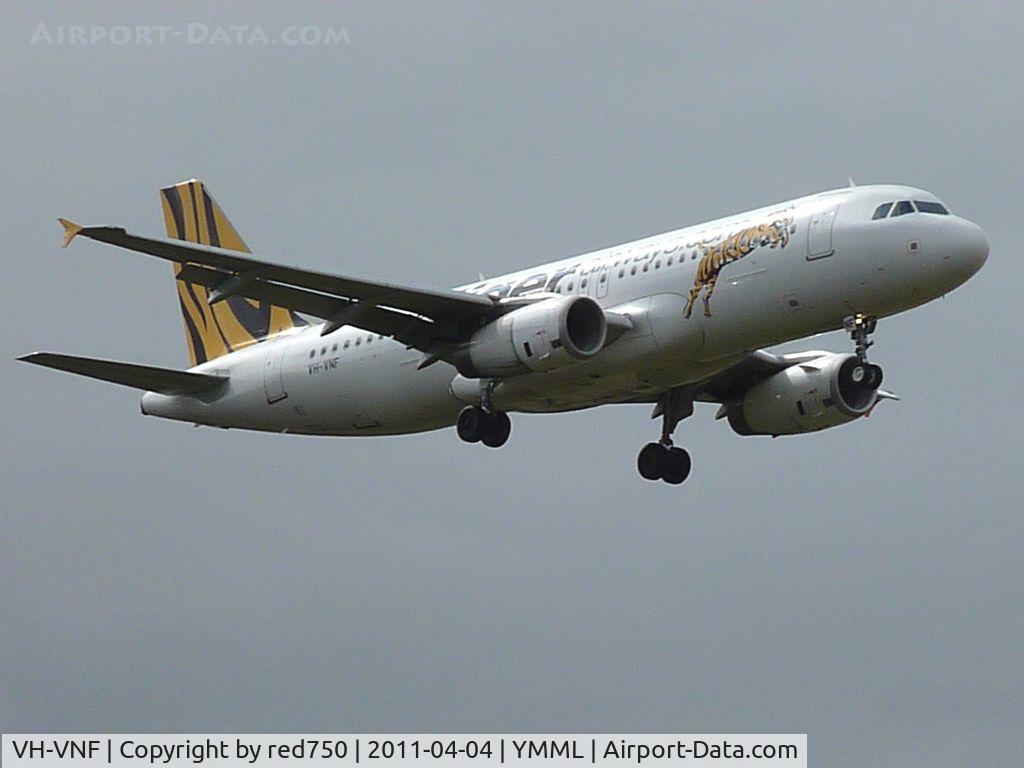 VH-VNF, 2007 Airbus A320-232 C/N 3332, Tiger Airways Victor November Foxtrot about to cross the fence on approach to Runway 16 at Melbourne (Tullamarine).