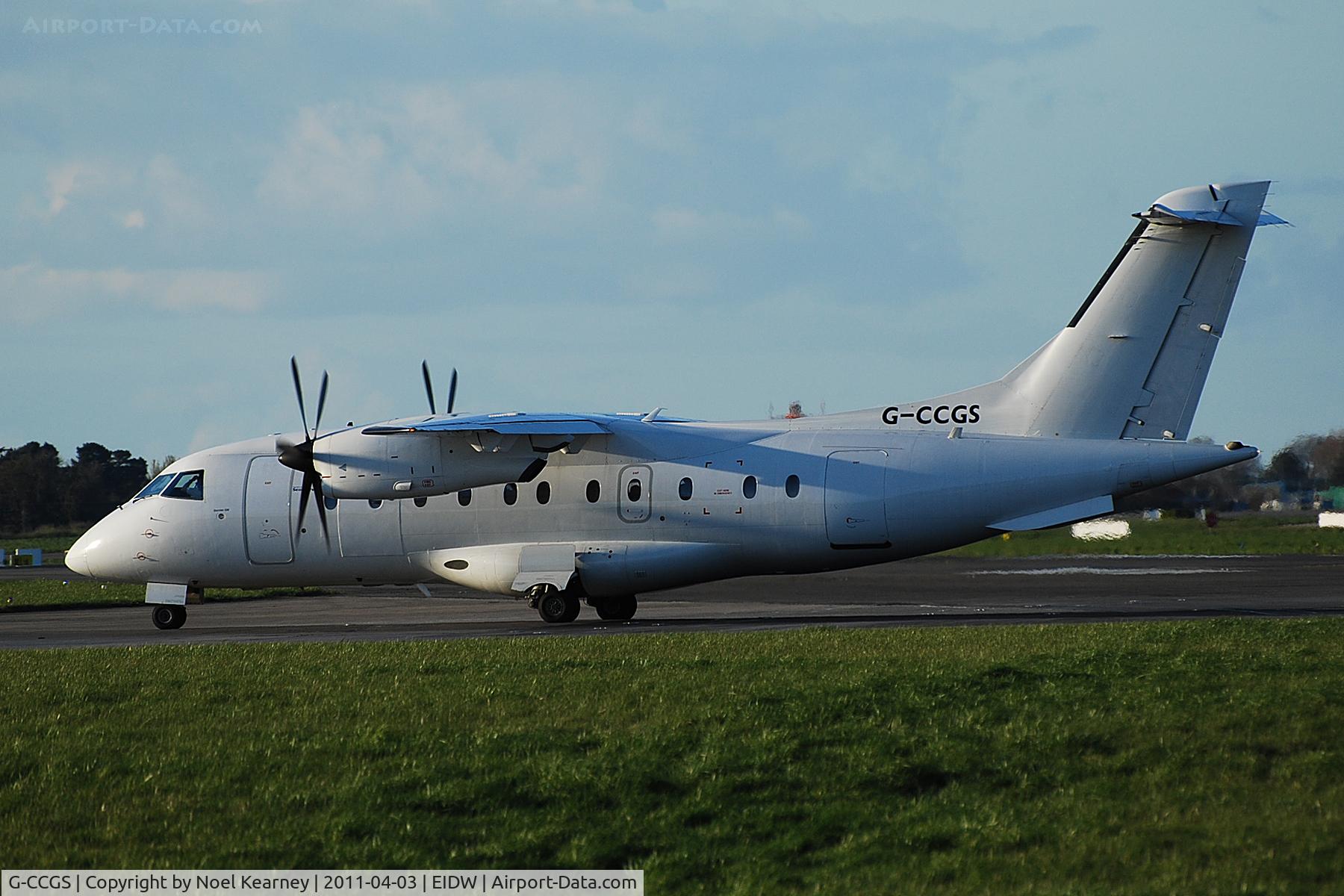 G-CCGS, 1998 Dornier 328-100 C/N 3101, Departing off Rwy 28 as the sun sets.