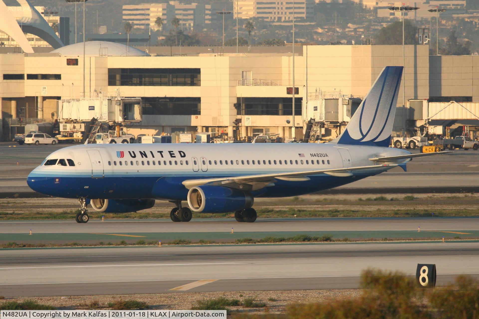 N482UA, 2001 Airbus A320-232 C/N 1584, United Airlines Airbus A320-232, arriving KLAX off 25L on TWY H.