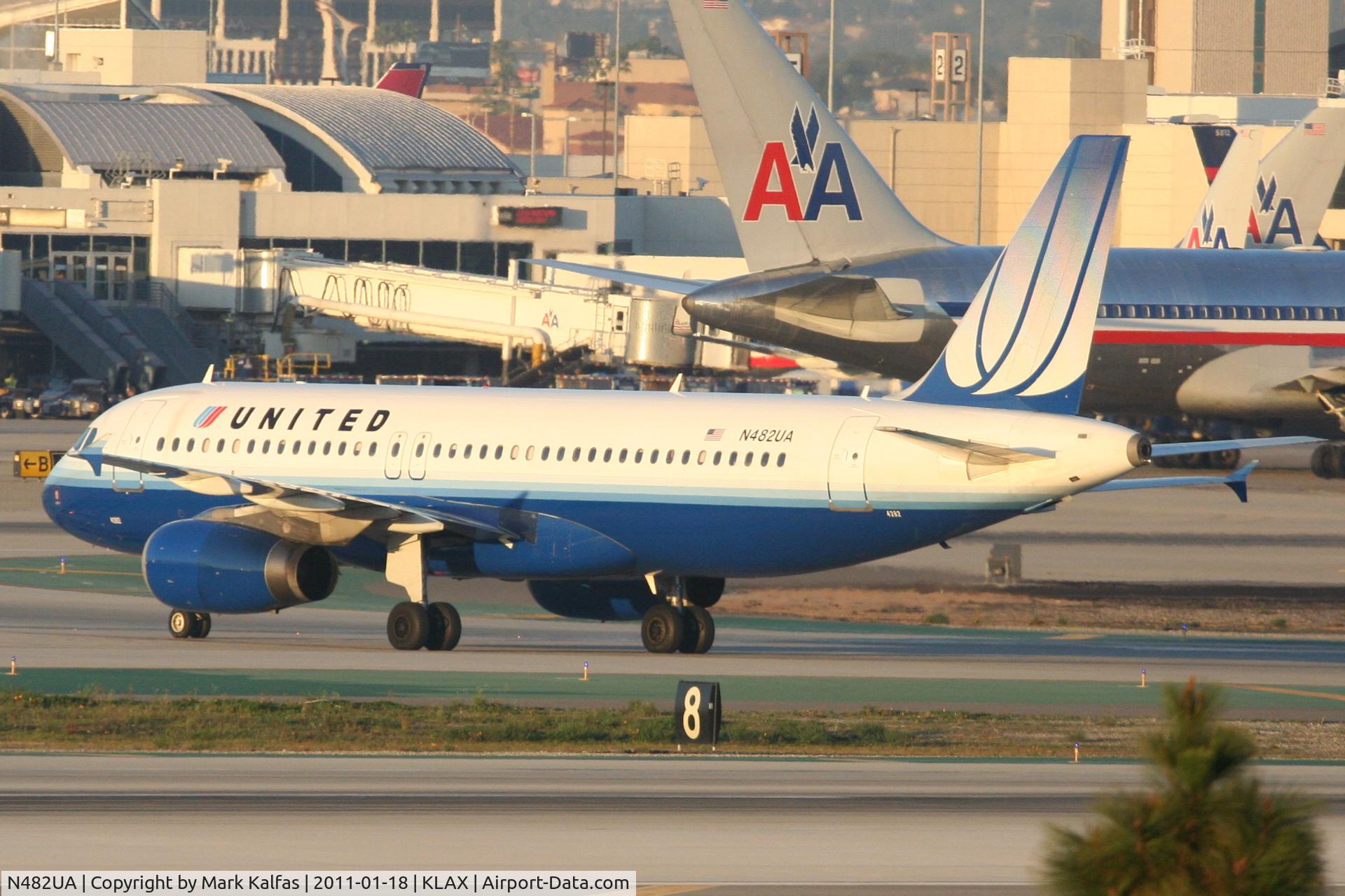 N482UA, 2001 Airbus A320-232 C/N 1584, United Airlines Airbus A320-232, arriving KLAX off 25L on TWY P.