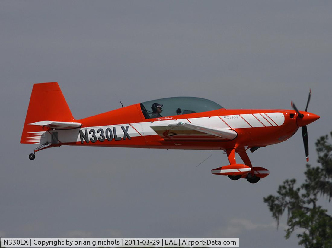 N330LX, Extra EA-300LC C/N LC001, Arriving at Sun 'n Fun, Lakeland, 2011
