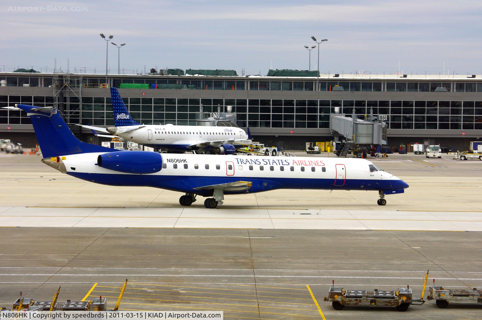 N806HK, 1999 Embraer EMB-145EP (ERJ-145EP) C/N 145112, Trans State Airlines taken in terminal.