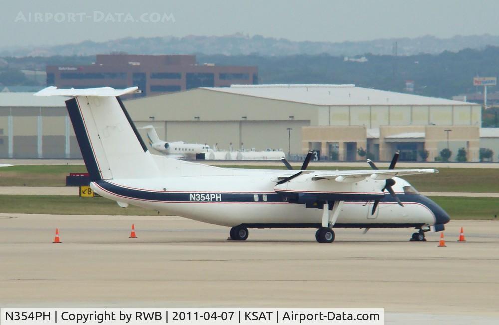 N354PH, 1997 De Havilland Canada DHC-8-202 Dash 8 C/N 498, Parked in the west cargo area