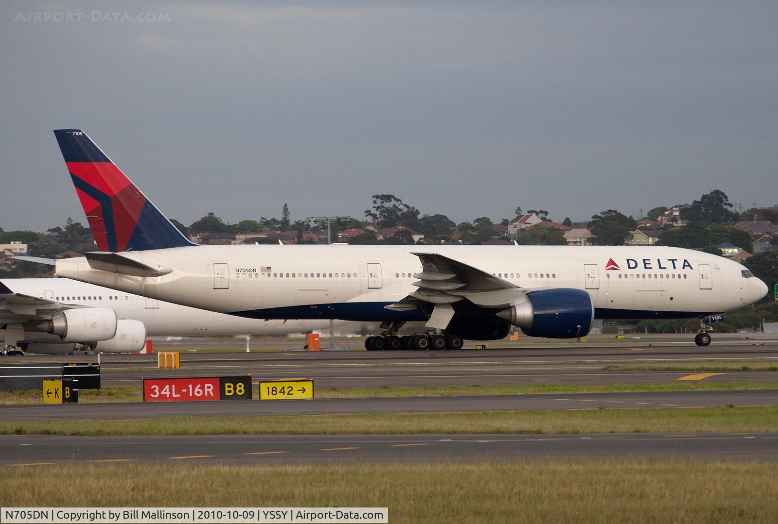 N705DN, 2008 Boeing 777-232/LR C/N 29742, after arriving on 34R