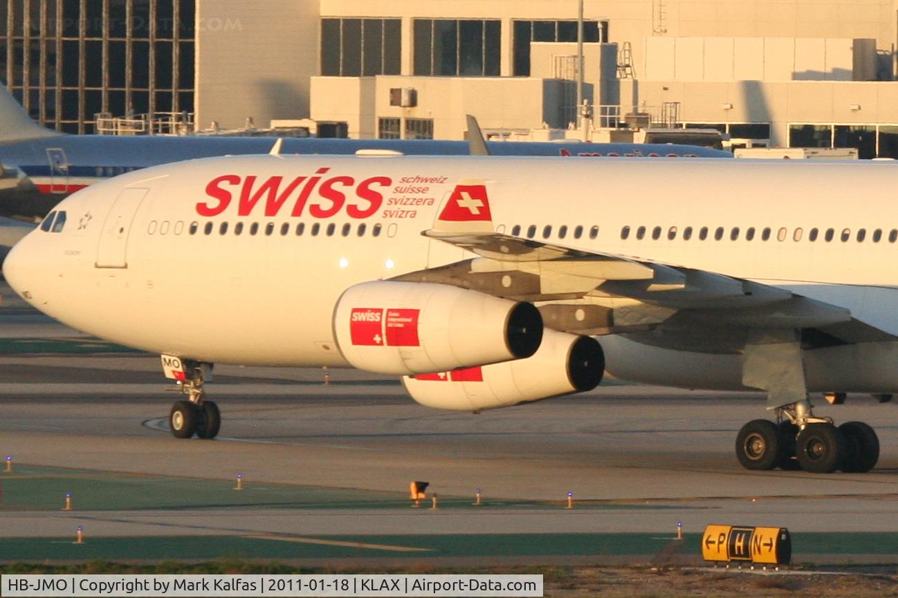 HB-JMO, 1997 Airbus A340-313 C/N 179, Swiss Airbus A340-313, SWR40 arriving from LSZH (Zurich-Kloten), turning onto TWY P KLAX.