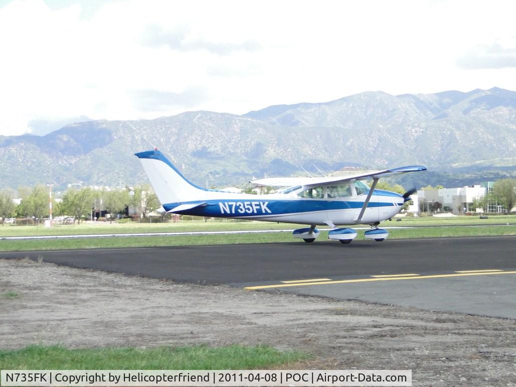 N735FK, 1977 Cessna 182Q Skylane C/N 18265388, Taxiing eastbound on taxiway Sierra to runway 26L