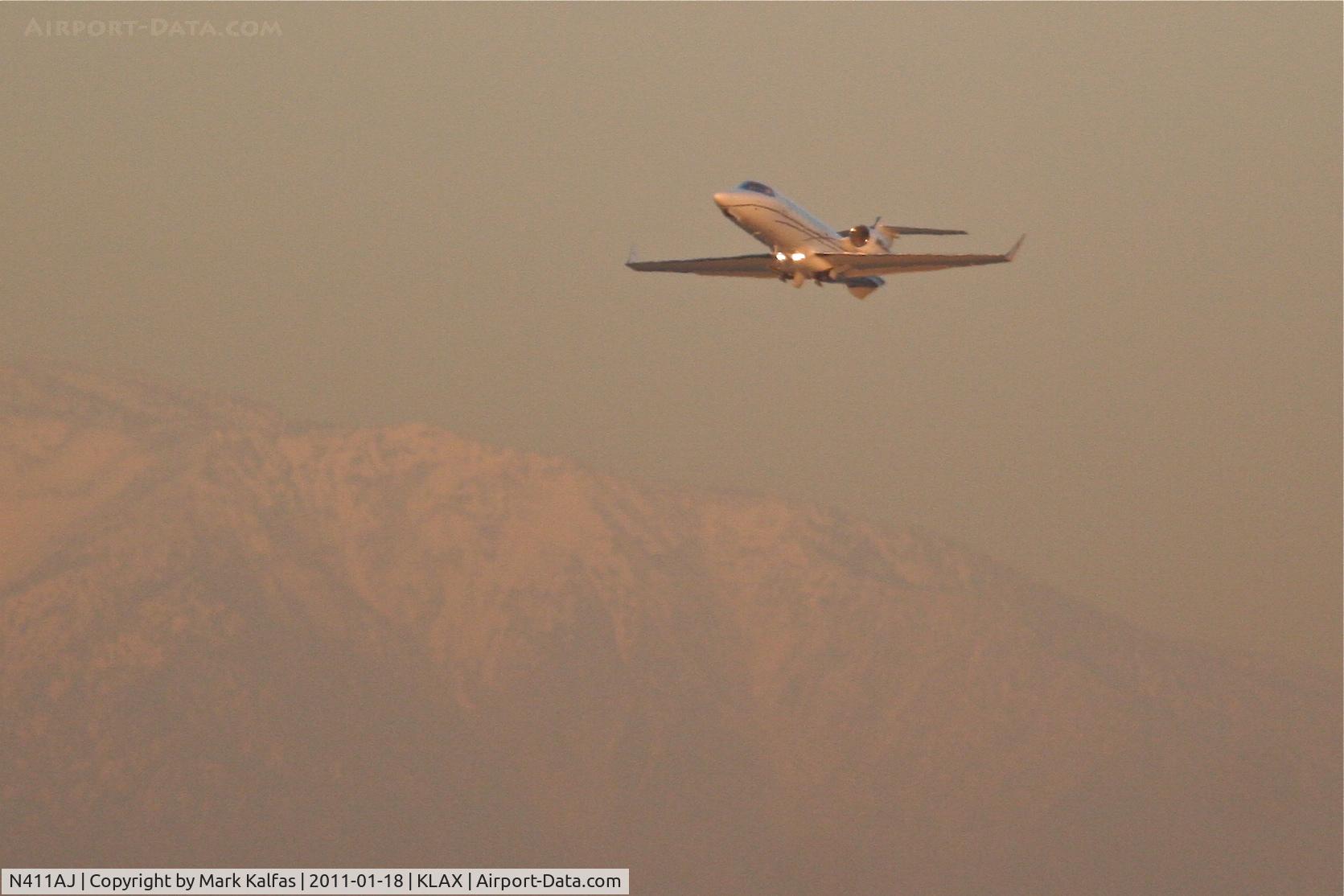 N411AJ, 2004 Learjet 40 C/N 40-2011, Learjet 45, departing RWY 25L KLAX enroute to KSDL.