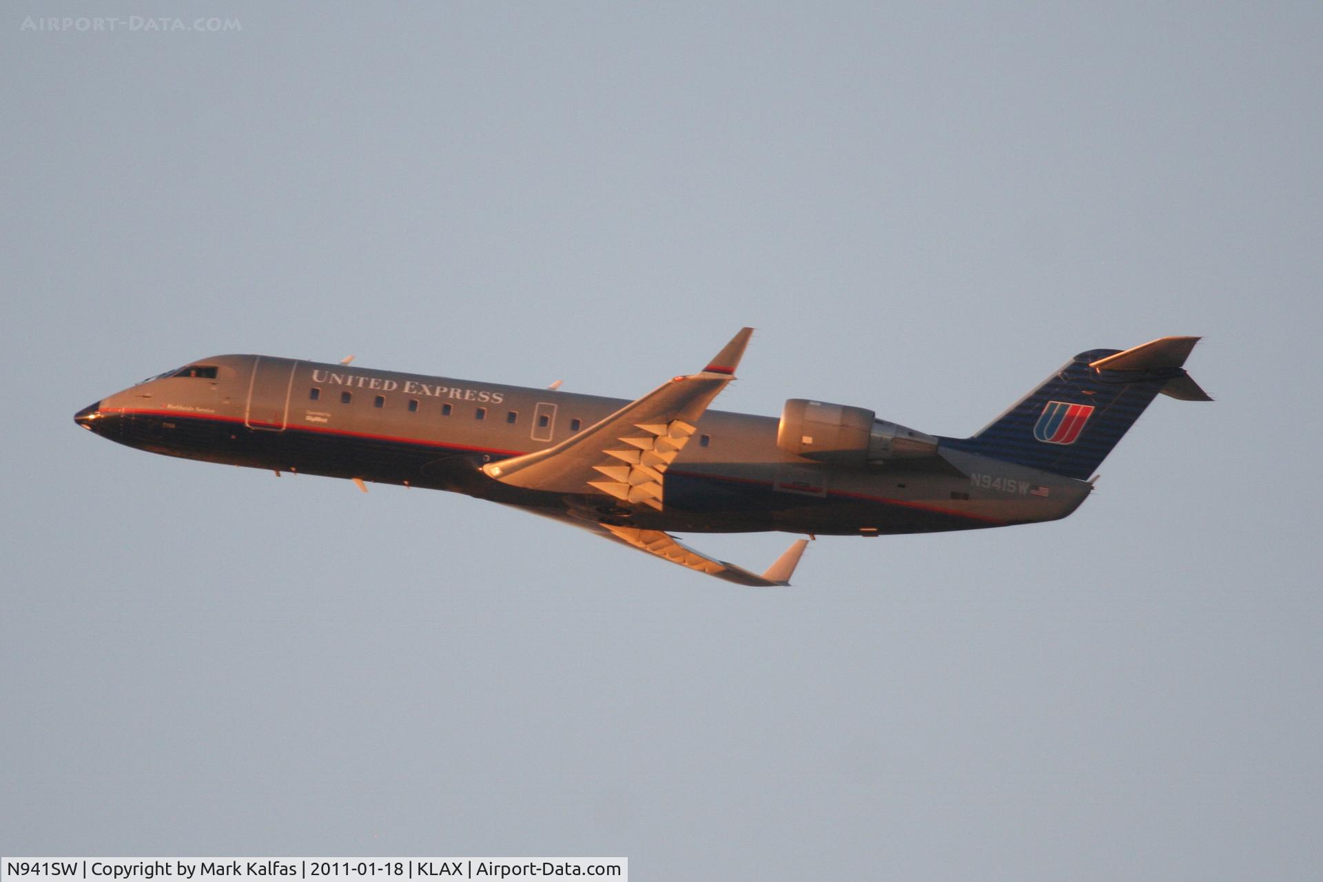 N941SW, 2003 Bombardier CRJ-200LR (CL-600-2B19) C/N 7750, SkyWest/United Express Bombardier CL-600-2B19, departing 25R KLAX enroute to KSMF.