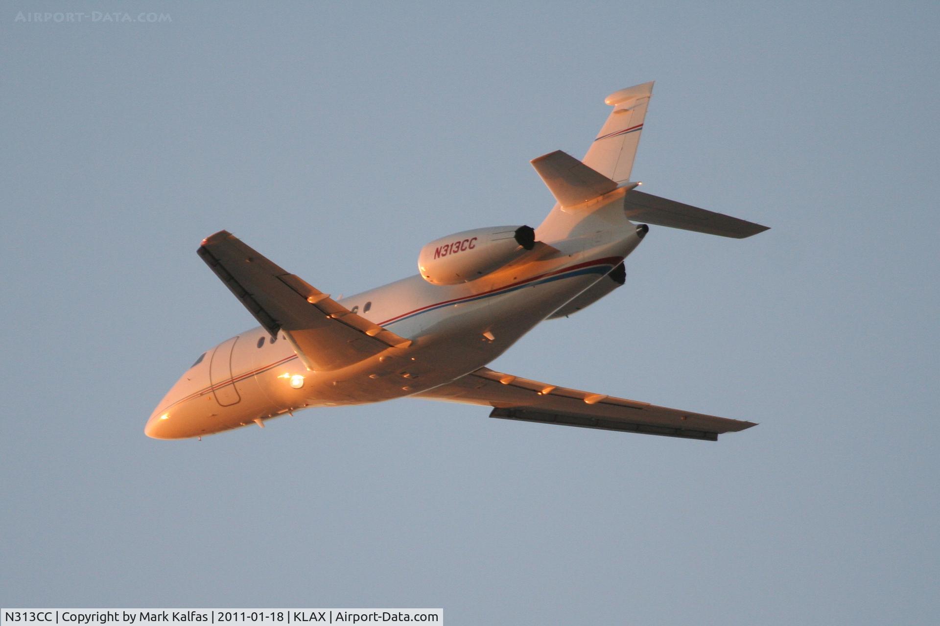 N313CC, 2003 Dassault Falcon 2000EX C/N 12, Dassault FALCON 2000EX, N313CC, departing 25L KLAX.