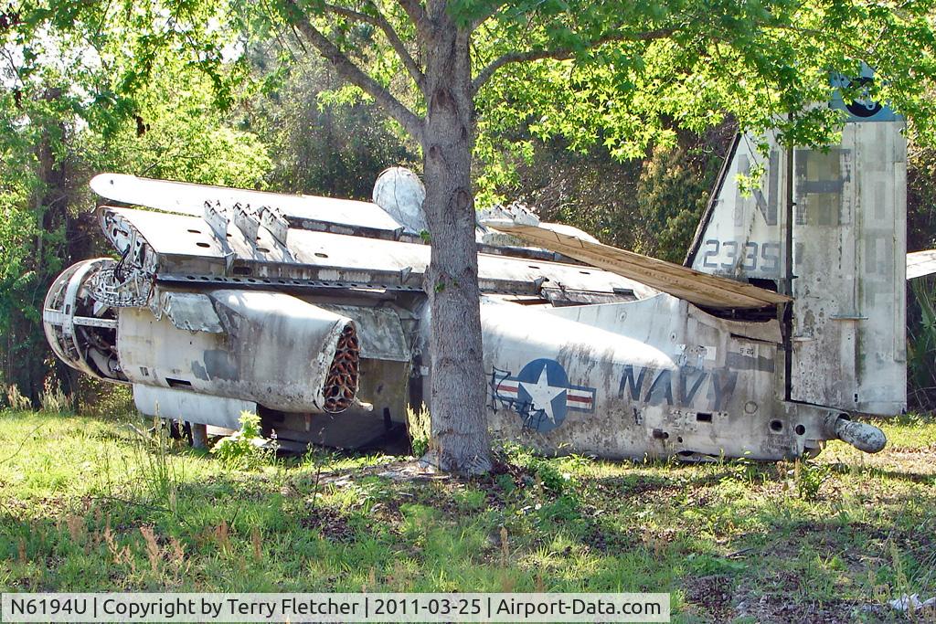 N6194U, Grumman S2F-3S Tracker C/N 152335, On the West Side of US-1 about 1 mile south of St.Augustine Airport FL - there is a grassed compound holding 9 x Ec Navy , Grumman Trackers