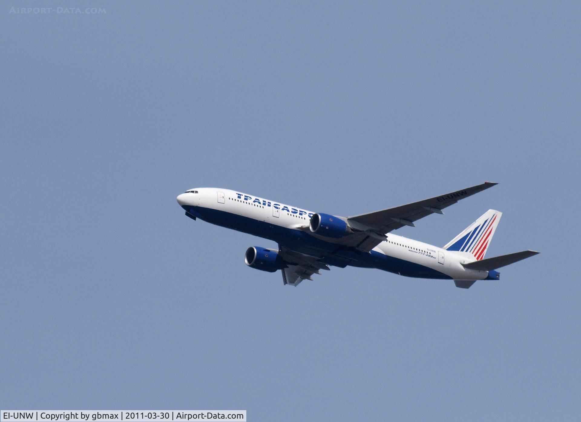EI-UNW, 1999 Boeing 777-222 C/N 30214, Flying over Mineola, NY, going to a landing at JFK