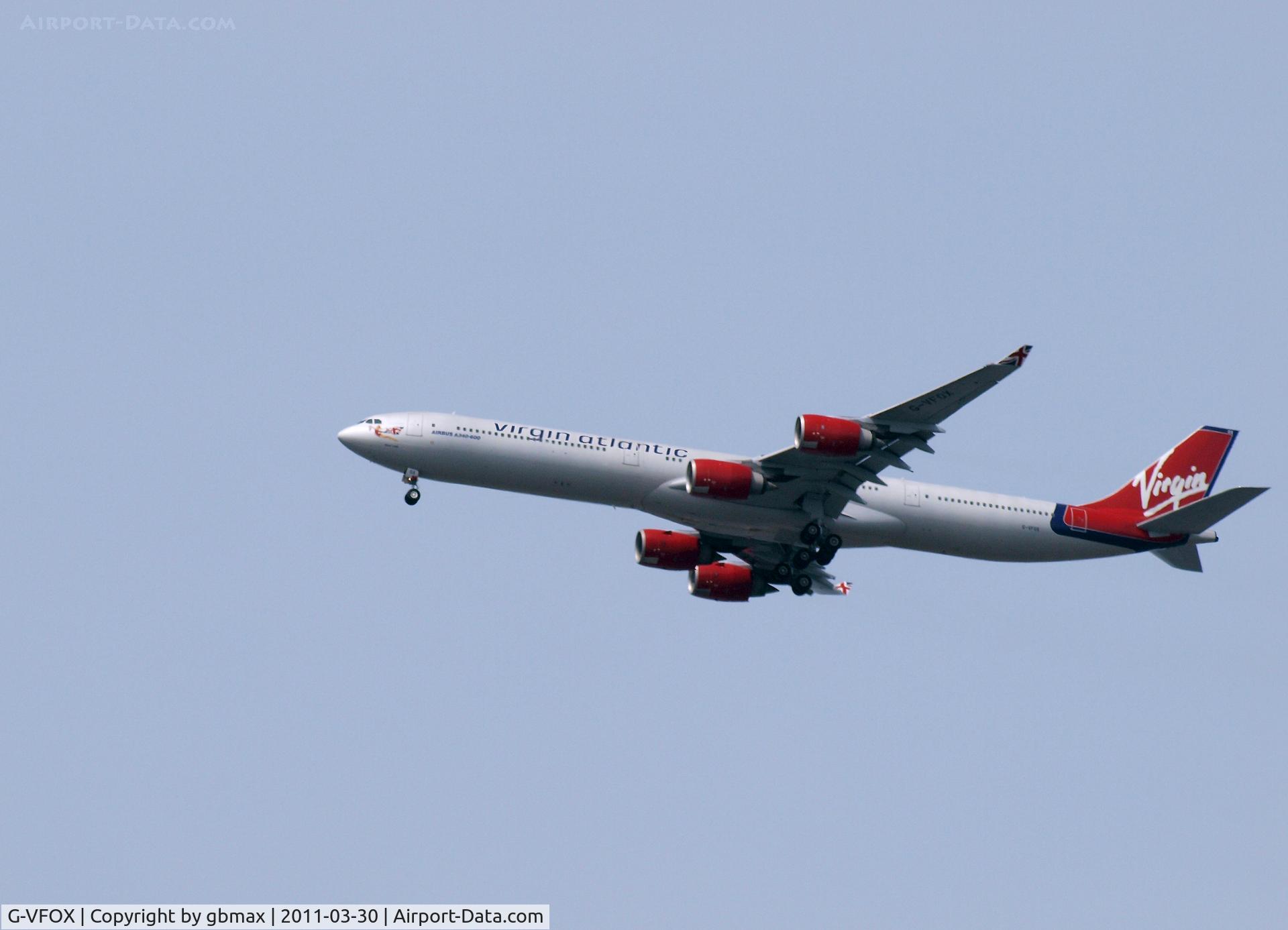 G-VFOX, 2002 Airbus A340-642 C/N 449, Flying over Mineola, NY, going to a landing at JFK