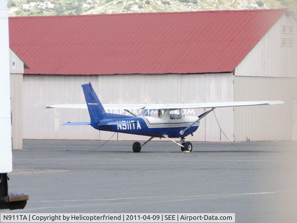 N911TA, 1982 Cessna 152 C/N 15285555, Parked between hangers