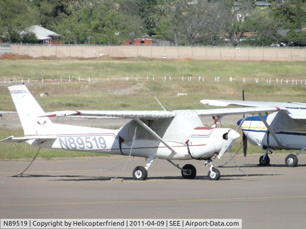 N89519, 1978 Cessna 152 C/N 15282767, Tied dwon, covered up, and parked by Admin Bldg