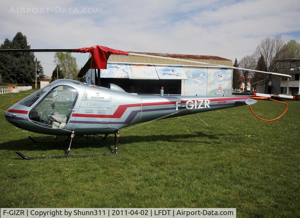 F-GIZR, 1974 Enstrom F-28A C/N 223, Parked in the grass...