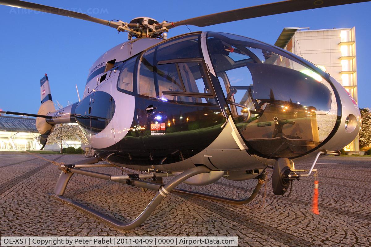 OE-XST, Eurocopter EC-120B Colibri C/N 1215, Linz Marathon Heli
parked in front of the Designcenter