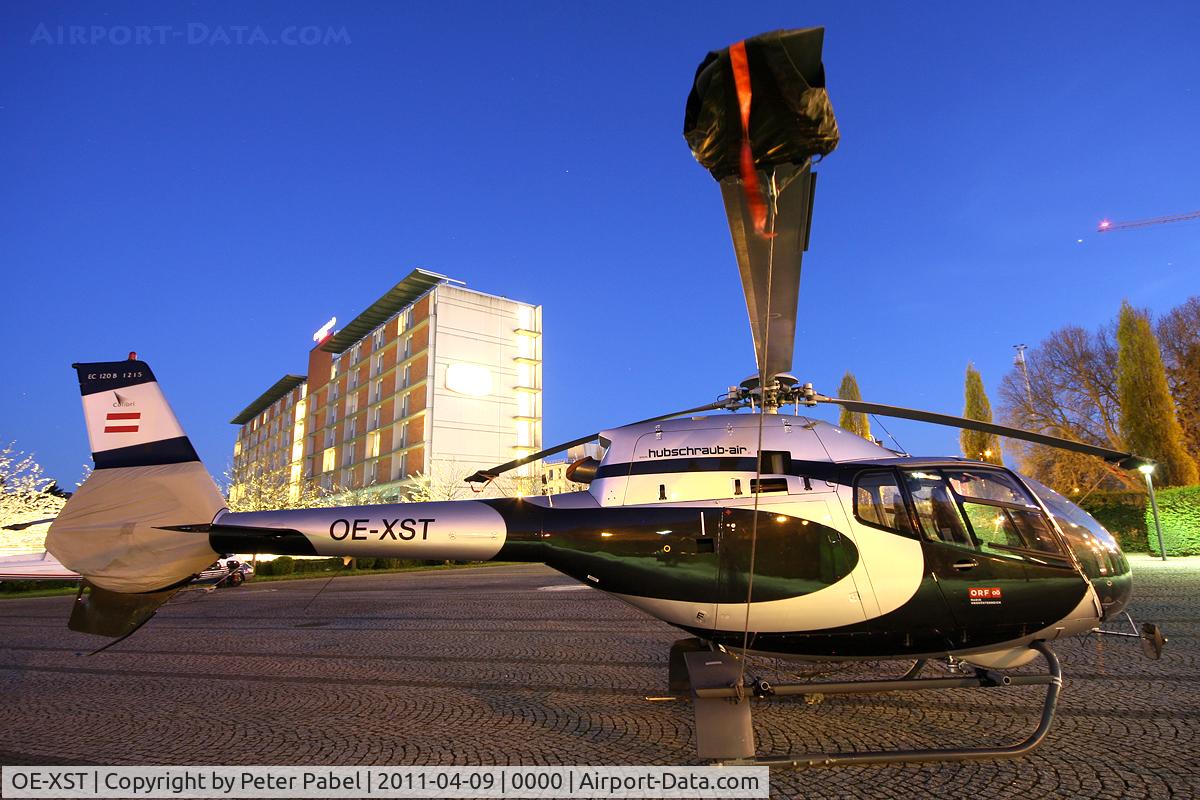 OE-XST, Eurocopter EC-120B Colibri C/N 1215, Linz Marathon Heli,
parked in front of the Designcenter