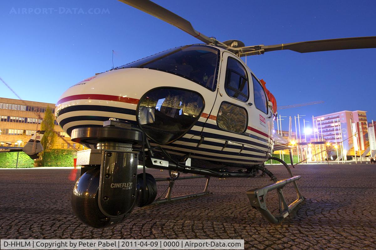 D-HHLM, Eurocopter AS-355NP Ecureuil 2 C/N 5777, Linz Marathon Heli,
parked in front of the Design Center