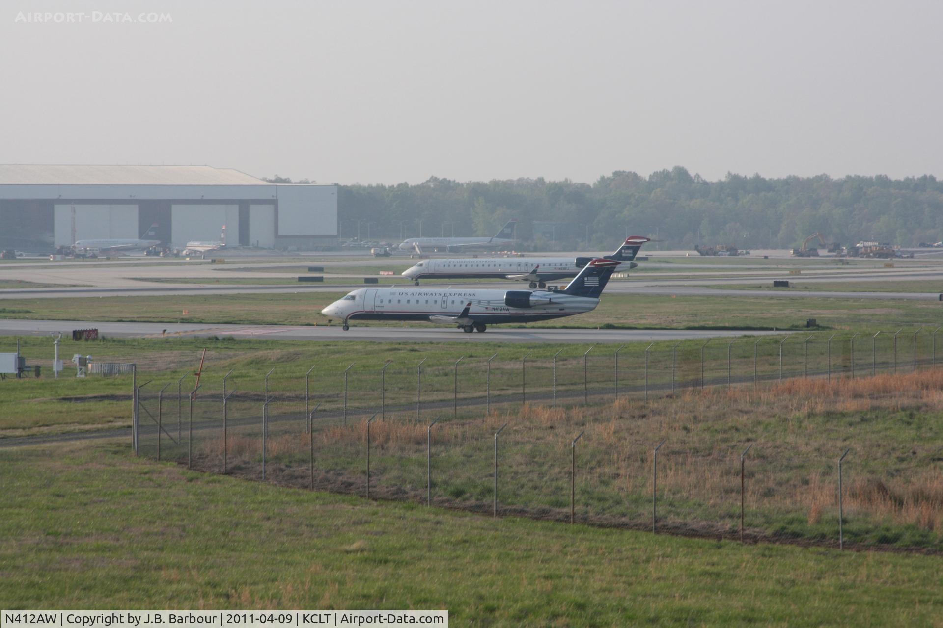 N412AW, 2001 Bombardier CRJ-200LR (CL-600-2B19) C/N 7582, 918FJ In the backgroud