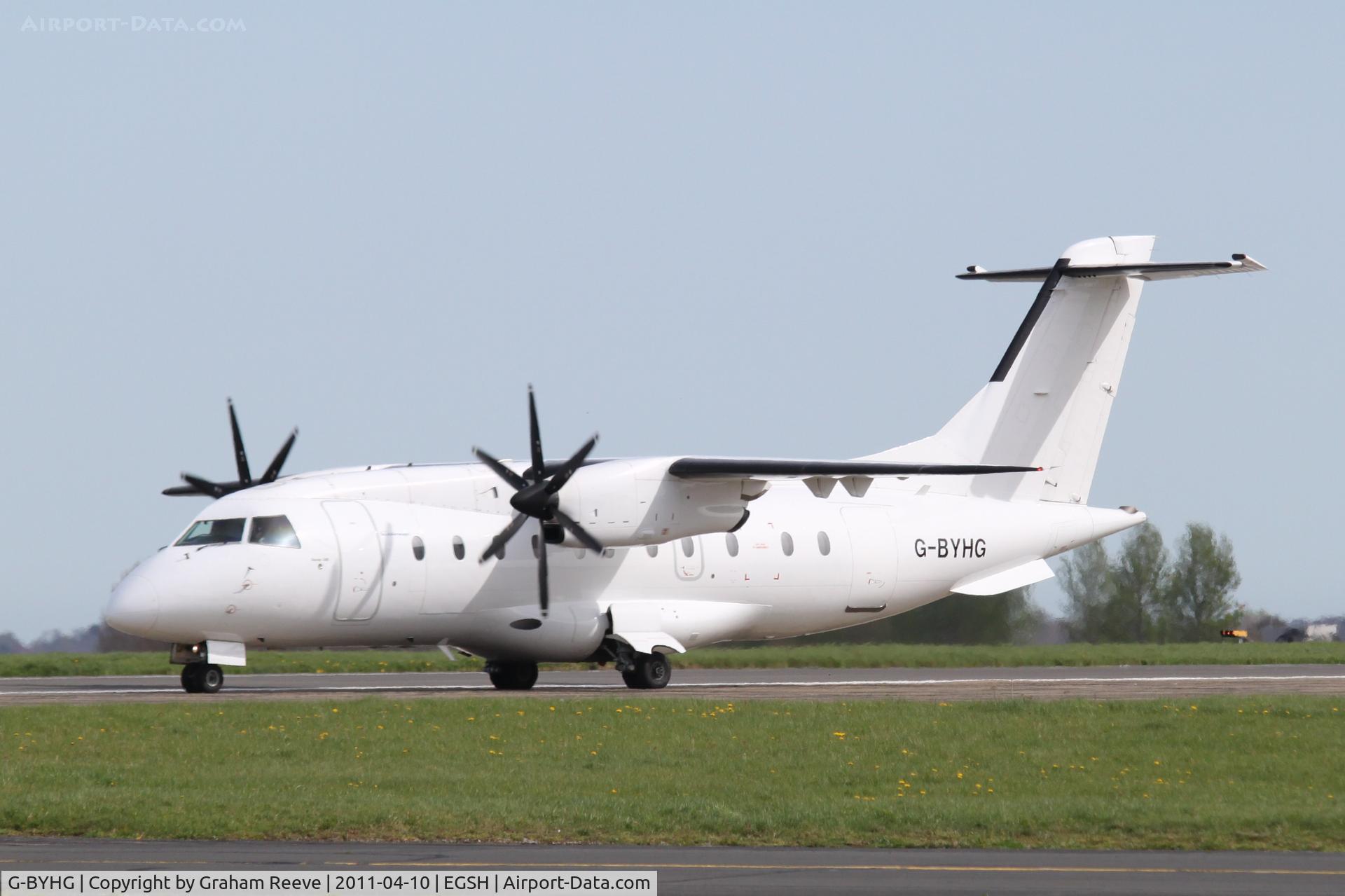 G-BYHG, 1998 Dornier 328-100 C/N 3098, Back tracking prior to take off.