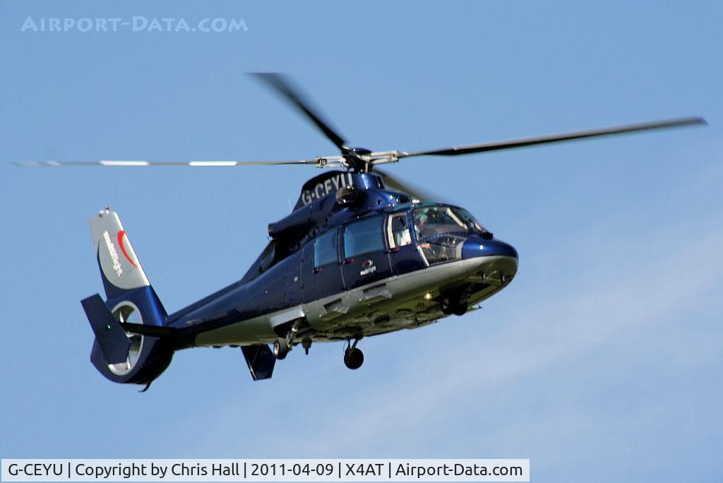 G-CEYU, 1988 Aerospatiale SA-365N-1 Dauphin 2 C/N 6298, Ferrying racegoers into Aintree for the 2011 Grand National