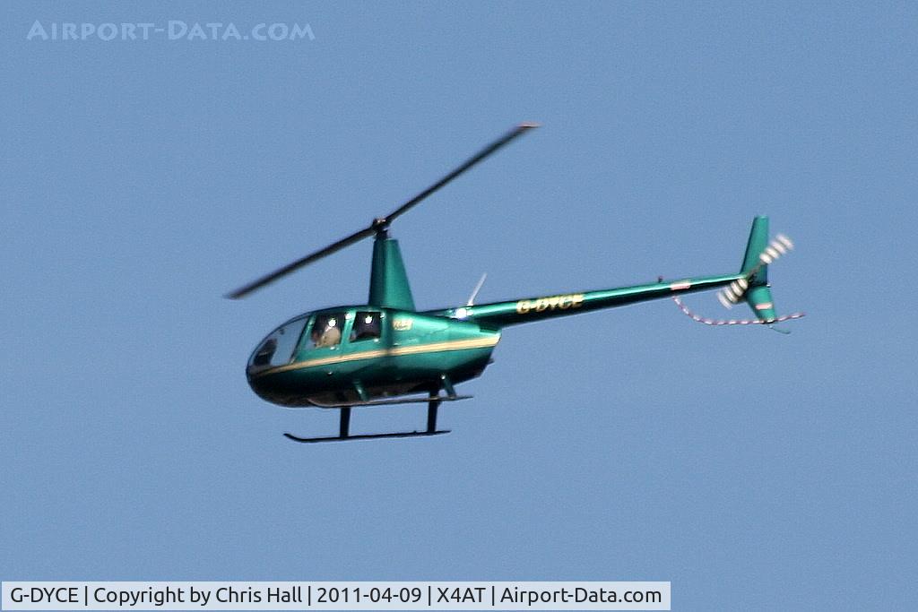 G-DYCE, 2003 Robinson R44 Raven II C/N 10148, Ferrying racegoers into Aintree for the 2011 Grand National