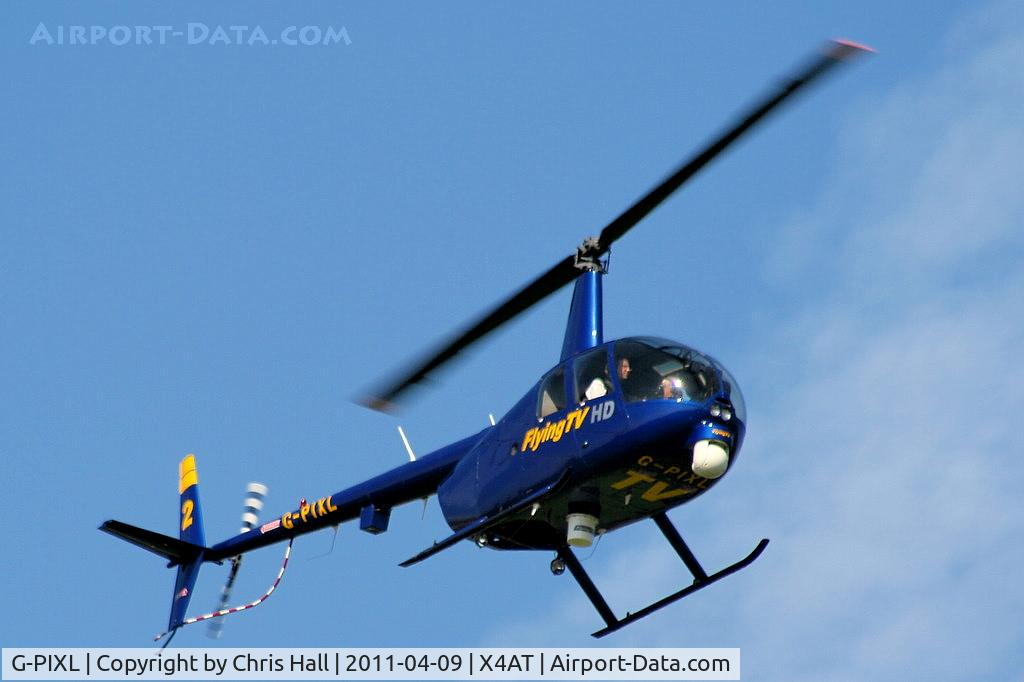 G-PIXL, 2006 Robinson R44 Raven II C/N 11221, Ferrying racegoers into Aintree for the 2011 Grand National