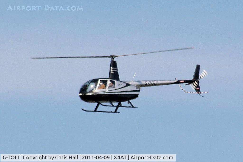 G-TOLI, 2007 Robinson R44 Raven II C/N 12009, Ferrying racegoers into Aintree for the 2011 Grand National