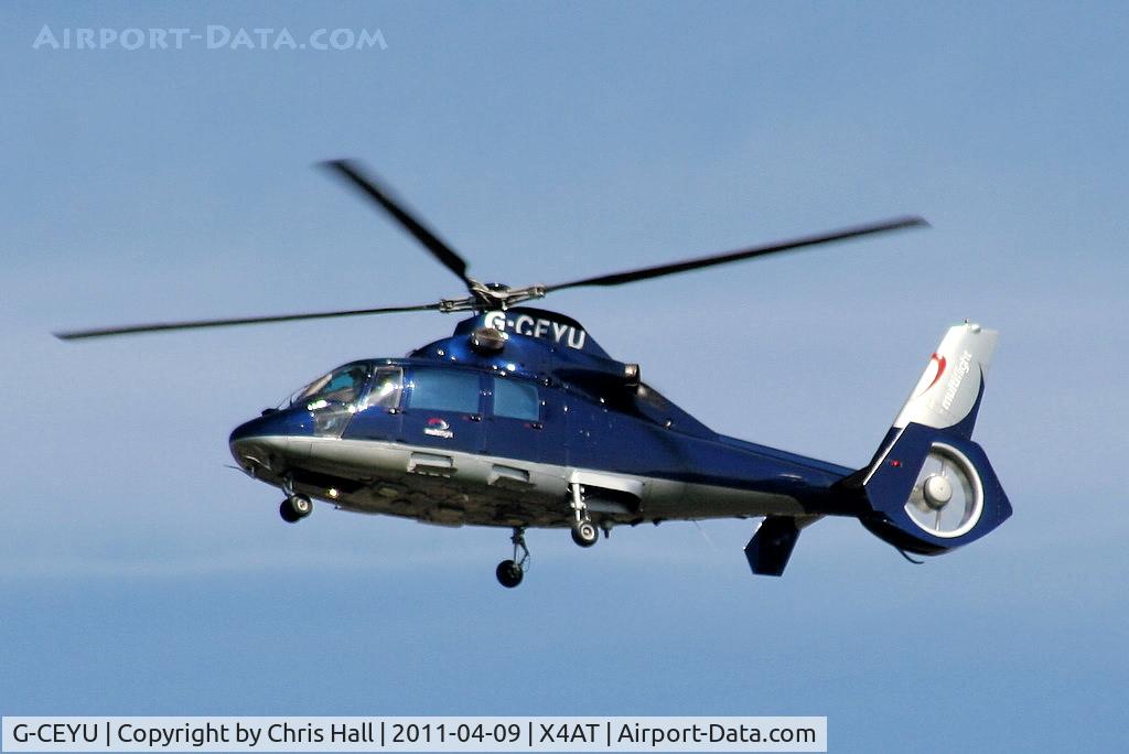 G-CEYU, 1988 Aerospatiale SA-365N-1 Dauphin 2 C/N 6298, Ferrying racegoers into Aintree for the 2011 Grand National