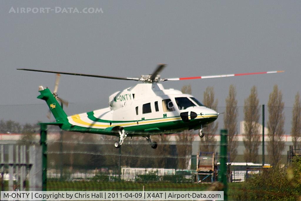 M-ONTY, 2007 Sikorsky S-76C C/N 760696, Ferrying racegoers into Aintree for the 2011 Grand National