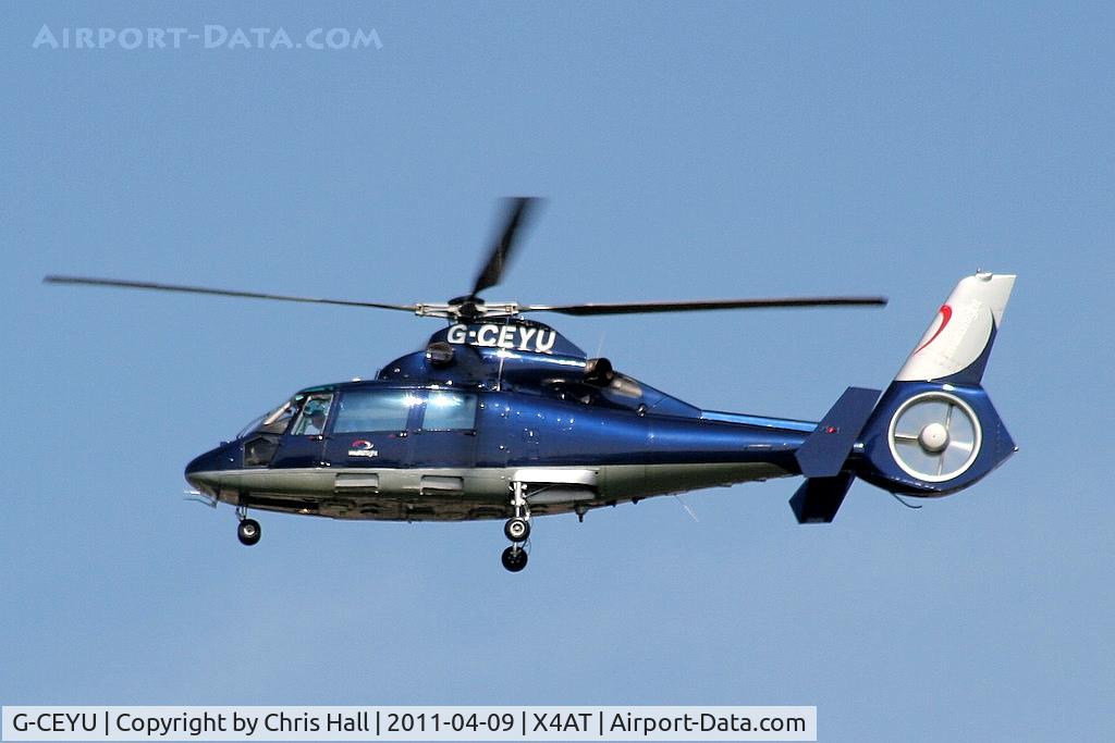 G-CEYU, 1988 Aerospatiale SA-365N-1 Dauphin 2 C/N 6298, Ferrying racegoers into Aintree for the 2011 Grand National
