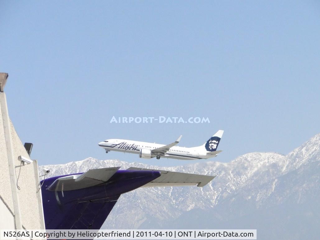 N526AS, 2009 Boeing 737-890 C/N 35196, Airbourne from runway 26R passing the parking area for Fed EX