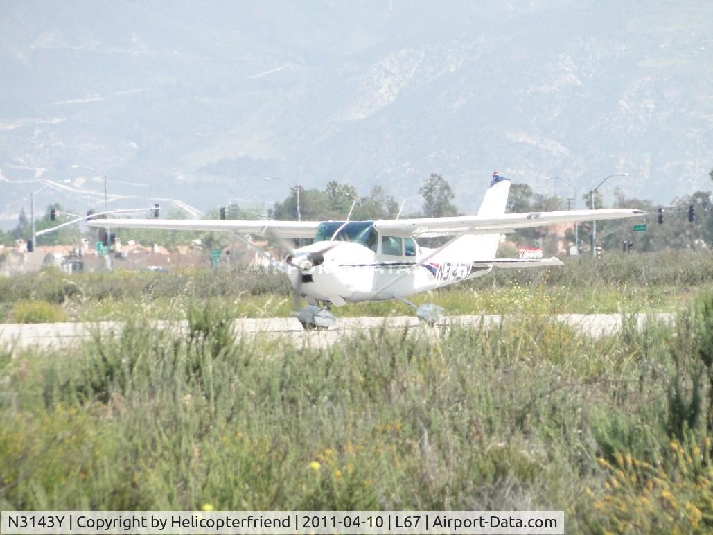 N3143Y, 1962 Cessna 182E Skylane C/N 18254143, Turning onto taxiway to go back for take off