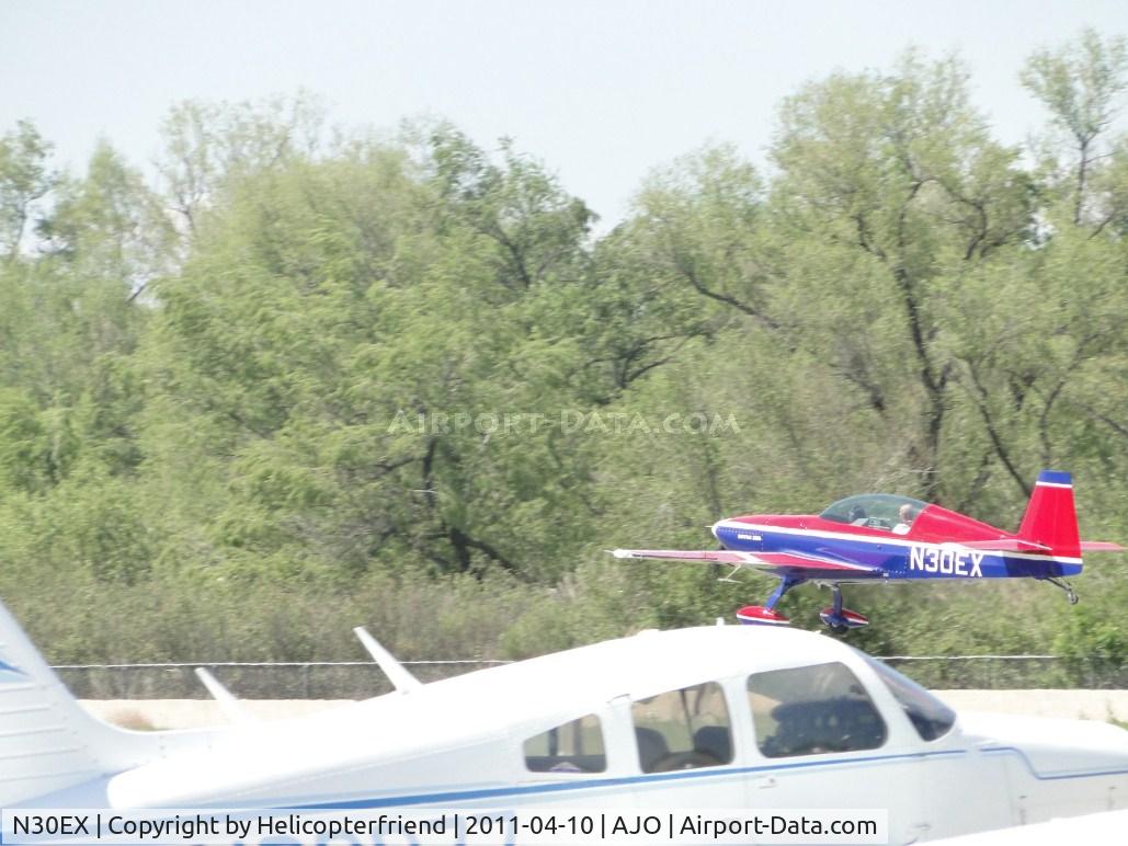 N30EX, Extra EA-300/L C/N 058, Taking off westbound