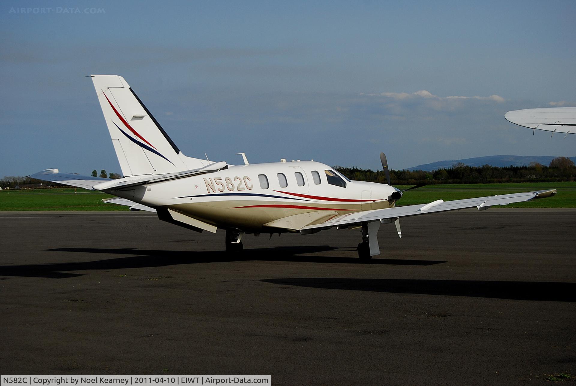 N582C, 2003 Socata TBM-700 C/N 274, Parked on the ramp at Weston. Operated by Islander Aviation Inc.