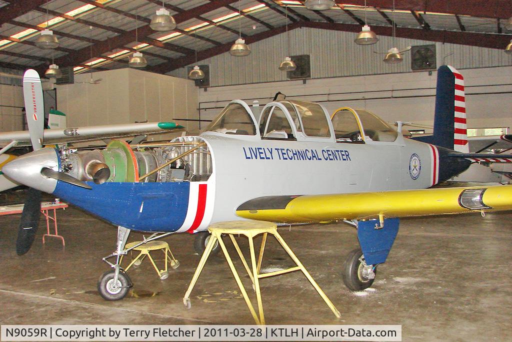 N9059R, 1960 Beech D-45 Mentor C/N BG-423, Unidentified aircraft Inside  the Lively Aviation School at Tallahassee Airport
