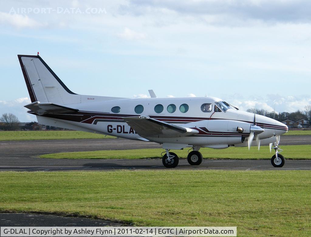 G-DLAL, 1976 Beech E90 King Air C/N LW-187, Taxies back to the hangar after engine runs.