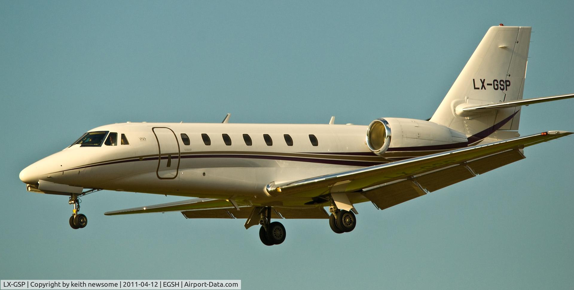 LX-GSP, 2010 Cessna 680 Citation Sovereign C/N 680-0302, landing into the sun at NWI 12/04/2011