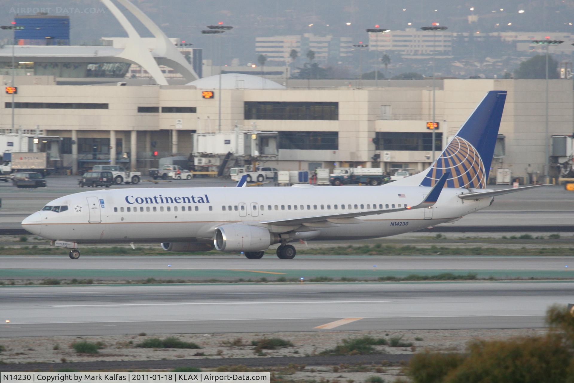 N14230, 1999 Boeing 737-824 C/N 28794, Continental Airlines Boeing 737-824, COA795 arriving from KIAH, on TWY H KLAX>