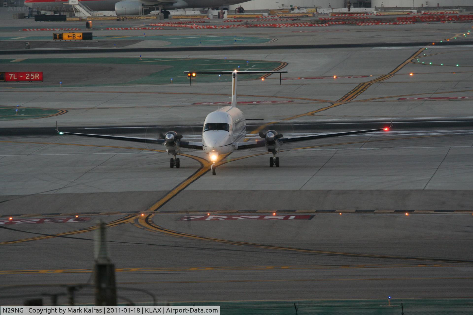 N29NG, 1997 Beech 1900D C/N UE-303, Northrop Grumman, Raytheon Aircraft Company 1900D on TWY T, crossing RWY 25L KLAX.