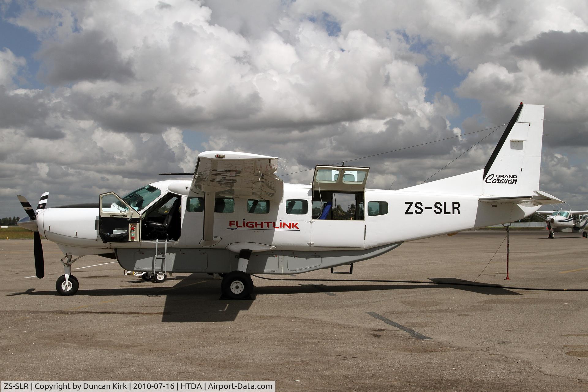 ZS-SLR, 1996 Cessna 208B Grand Caravan C/N 208B0497, Readying for another flight at the Dar Es Salaam commuter terminal