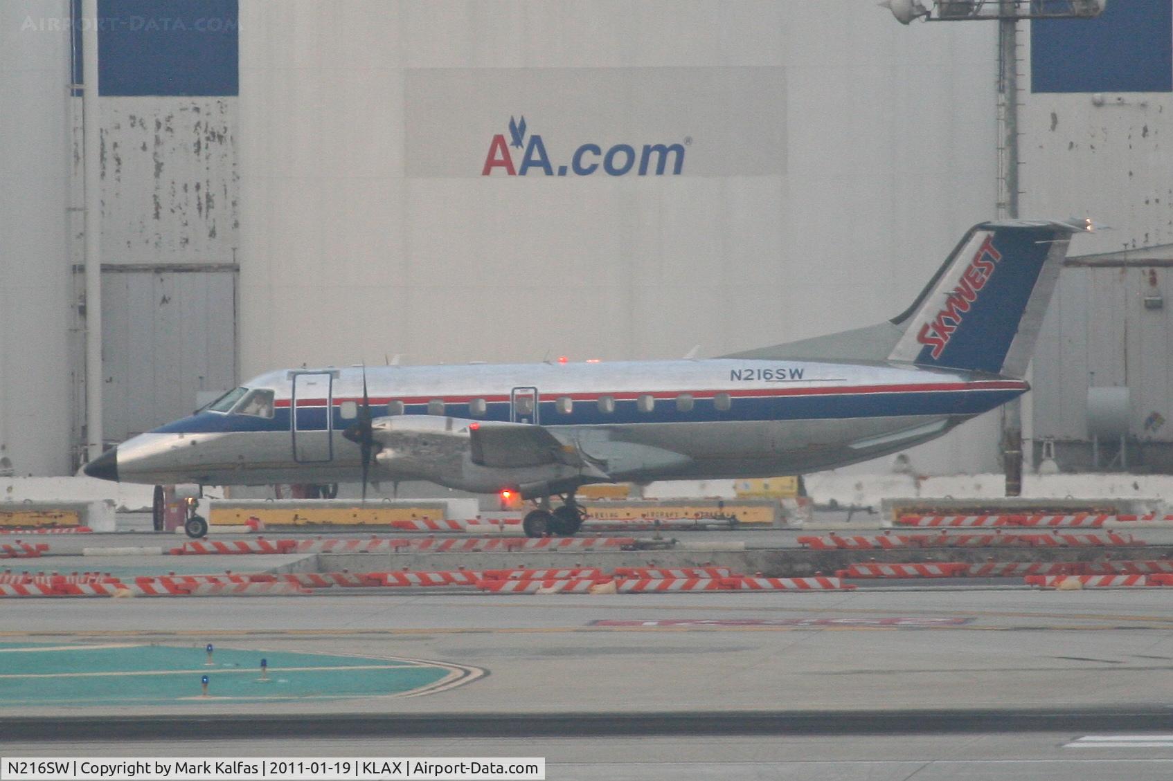 N216SW, 1993 Embraer EMB-120 Brasilia C/N 120.285, SkyWest/United Express Embraer EMB-120 on TWY C KLAX.