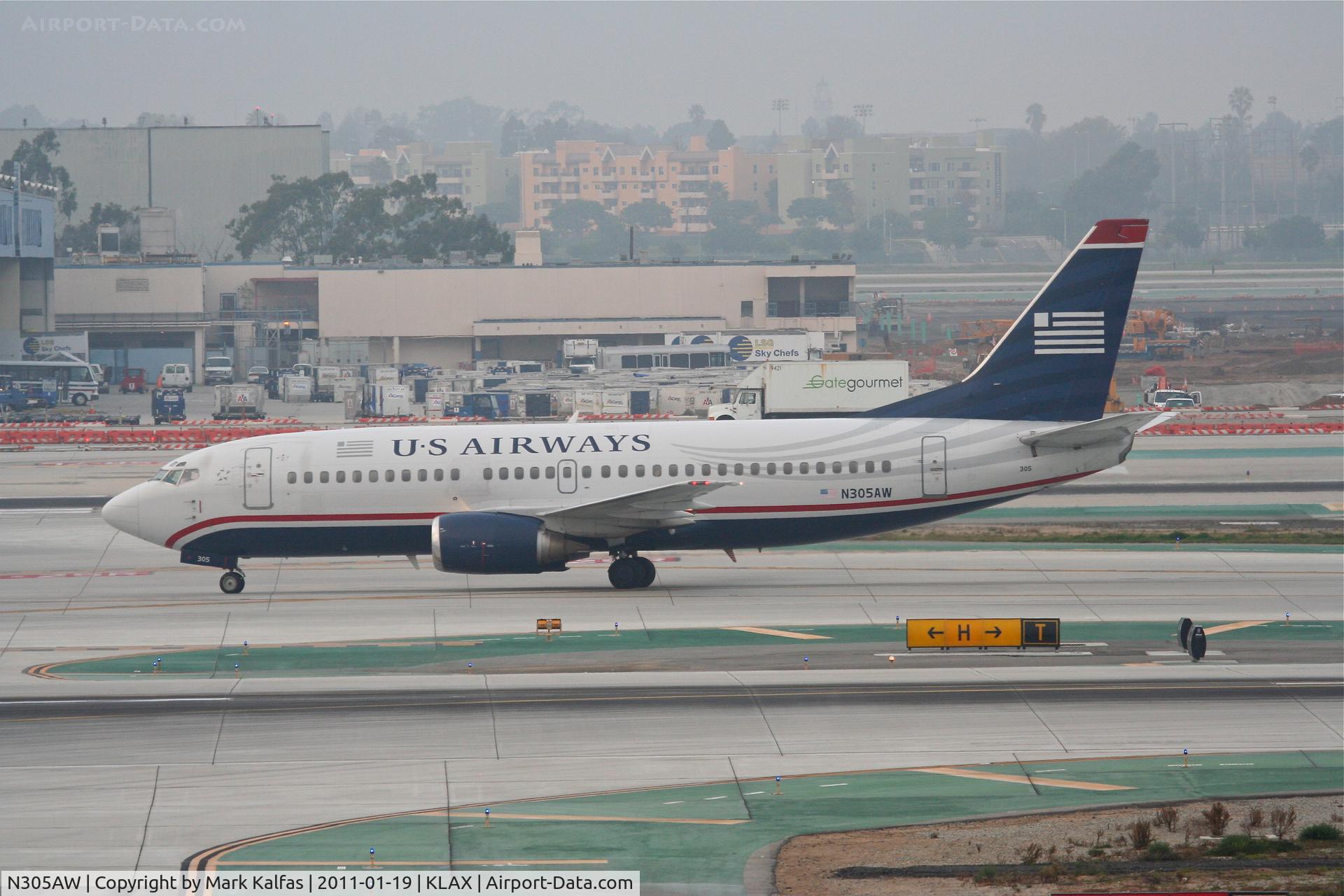 N305AW, 1988 Boeing 737-3G7 C/N 24012, US AIRWAYS Boeing 737-3G7, AWE543 arriving from KLAS, on TWY H KLAX.