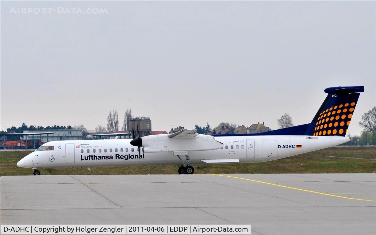 D-ADHC, 2001 De Havilland Canada DHC-8-402Q Dash 8 C/N 4045, Daily morning shuttle to DUS is lining up for take-off on two six left.